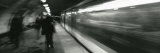 Subway Train Passing through a Subway Station  London  England