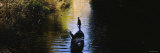 Gondolier Rowing a Gondola  Neckar River  Tuebingen  Germany