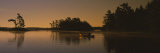 Silhouette of a Person in a Canoe on a Lake  Kejimkujik Lake  Nova Scotia  Canada