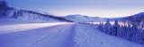 Highway Running through a Snow Covered Landscape  Akureyri  Iceland