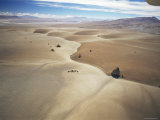 Barren Landscape and a Solitary Dirt Road Through the Altiplano at 4500M  Bolivia  South America
