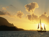 Sailing Yacht at Sunset off Coast of Hanalai Bay  Kauai  Hawaii  USA