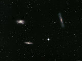 The Leo Triplet  Also Known as the M66 Group  is a Small Group of Galaxies in the Constellation Leo
