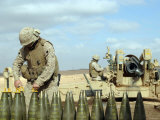 A US Marine Prepares Howitzer Rounds to be Fired Near Baghdadi  Iraq  January 6  2007