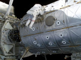 Mission Specialist Traverses Along the Destiny Laboratory of the International Space Station