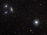 Messier 77 (NGC 1068)  and NGC 1055 are Both Spiral Galaxies Located in the Constellation Cetus