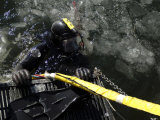 US Navy Diver Gets Ready to Start His Dive off the Back of a Dive Training Boat