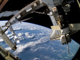 The Docked Space Shuttle Atlantis (STS-115) and a Soyuz Spacecraft