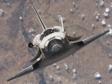 The Space Shuttle Discovery Approaches the International Space Station for Docking