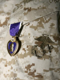 A Soldier Wears His Purple Heart on His Digital Camouflage Minutes after Being Awarded the Medal