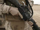 A Marine Displays the Required Hand Personal Protective Equipment