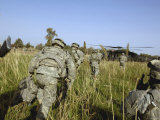 US Army Soldiers Prepare to Board a UH-60 Black Hawk Helicopter