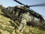 US Army Soldiers Board a UH-60 Black Hawk Helicopter