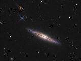 NGC 4013 is an Edge-On Unbarred Spiral Galaxy in the Constellation Ursa Major