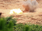 Ten Half-Pound Blocks of TNT Simultaneously Detonate at Camp Schwab's Demo Range Three