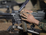 A Marine Loads a M-240G