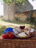Picnic Lunch of Bread  Cheese  Tomatoes and Red Wine on a Hamper in the Dordogne  France
