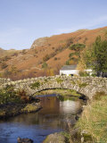 Old Stone Packhorse Bridge Over Watendlath Beck in Picturesque Village in Autumn