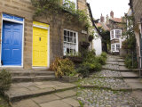 Yellow and Blue Doors on Houses in the Opening  Robin Hood's Bay  England