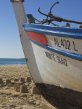 Traditional Fishing Boat and Sand Castles  Fishermans Beach  Albufeira  Algarve  Portugal