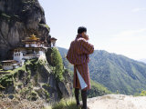 Bhutanese Man with Cell Phone  Taktshang Goemba (Tiger's Nest) Monastery  Paro  Bhutan