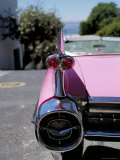 Close-Up of Fin and Lights on a Pink Cadillac Car