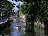 Tourists in Boat on Canal  Bruges  Belgium