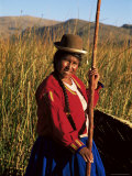 Uros Indian Woman in Traditional Reed Boat  Islas Flotantes  Lake Titicaca  Peru  South America