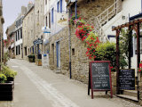 Narrow Street with Half Timbered Houses and Seafood Restaurants  Cote De Granit Rose  Brittany