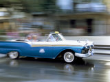 Panned Shot of Old American Car Splashing Through Puddle on Prado  Havana  Cuba  West Indies