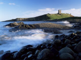 Dunstanburgh Castle  a National Trust Property  from Embleton Bay  Northumberland  England