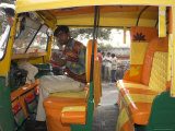 Rickshaw Owner Sitting in His Newly Decorated Moto Rickshaw  Agra  Uttar Pradesh State  India