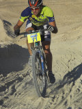 Competitior Riding Uphill on Sandy Track in Mount Sodom International Mountain Bike Race  Israel