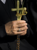 A Nun's Hands Holding Two Crosses Made of Palm Leaves  St Anne Church  Israel