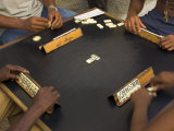 The Hands of a Group of Four People Playing Dominos in the Street Centro Habana