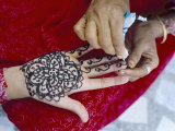 Henna Designs Being Applied to a Woman's Hand  Rajasthan State  India