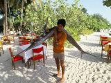 Boy Carrying Freshly Caught Swordfish  Embudu  the Maldives  Indian Ocean