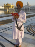 Sikh Pilgrim with Orange Turban  White Dress and Dagger  Reading Prayer Book  Amritsar