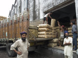 Truck Drivers in Front of Tea Sacks Being Unloaded at Kolkata Port