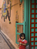 Small Girl Standing in Doorway of Typical House Decorated with Mewar Folk Art  Old City