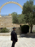 Jewish Man in Traditional Clothes in Front of the Hurva Synagogue Arch  Jerusalem  Israel