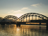 Sunset on the Daugava River and Steel Arches of Railway Bridge  Riga  Latvia  Baltic States