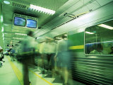 Passengers Boarding Train at Parliament Station in the City of Melbourne  Victoria  Australia