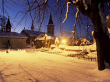 Snow-Covered Graveyard and Catholic Church in Village of Luceny Nad Nisou