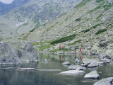 Hikers Walking Along Batizovske Pleso (Lake) in Vysoke Tatry Mountains  Presov Region  Slovakia