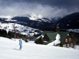 Winter View of Skier on Slopes at Pec Pod Snezkou with Snezka Mountain in Background  Bohemia