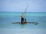 Man Sailing a Fishing Boat on the Indian Ocean  Zanzibar  Tanzania  East Africa  Africa