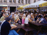 People at an Outdoor Restaurant in Plaza Along Kalku Iela  Old Town  Riga  Latvia