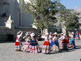 Girls in Traditional Local Dress Dancing in Square at Yanque Village  Colca Canyon  Peru