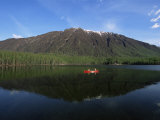 Man and Woman Canoeing in Mirror Lake  Chugach Mountains  Anchorage  Alaska  USA